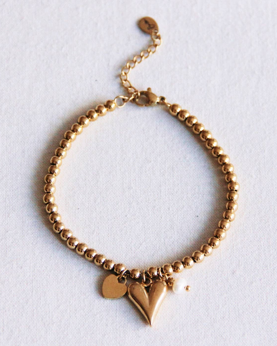 Perlenarmband mit Herzen und Mini-Perle